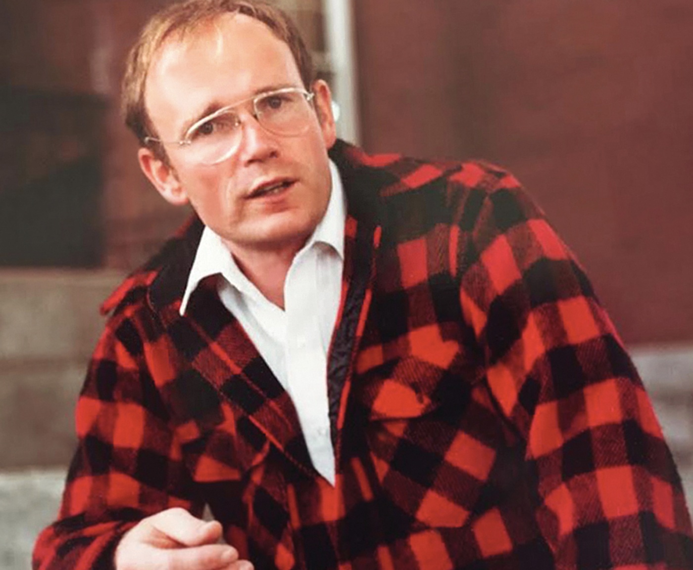 Photo of Tom Eastler &rsquo;66 in a red/black plaid coat